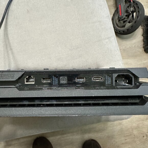 Sony PlayStation 4 Pro (PS4 Pro) Black Video Game Console with 2 Controllers 1TB - Picture 3 of 4